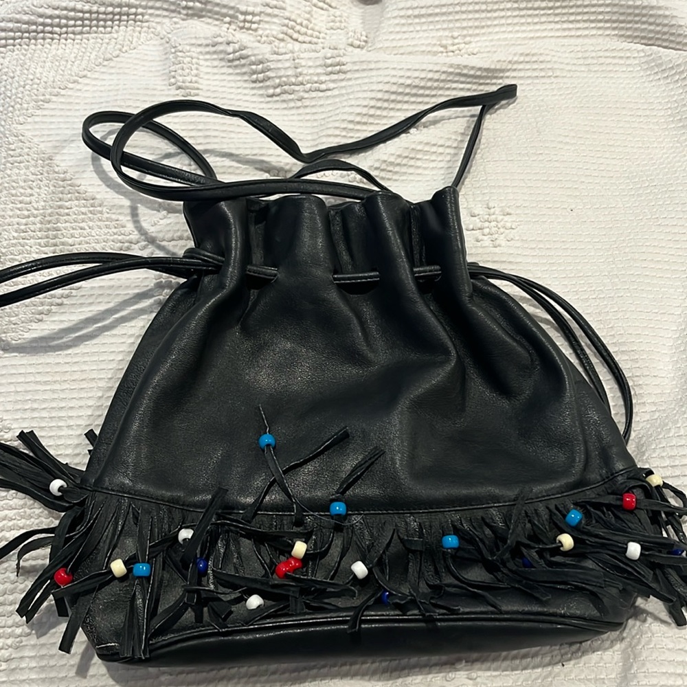 Vintage leather bucket bag….